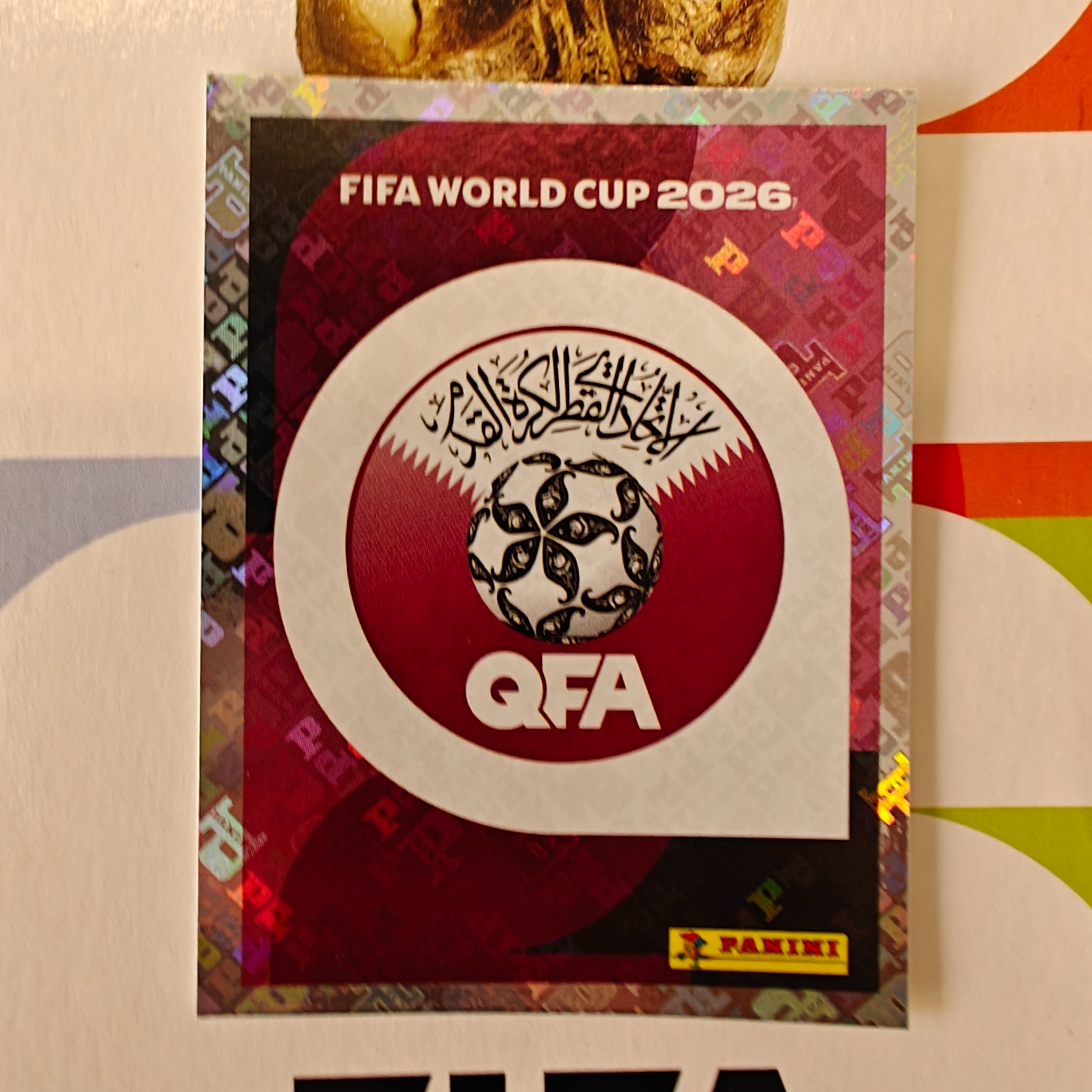 QAT1 - Qatar - Emblem - FIFA World Cup 2026™ - Panini Foil Sticker